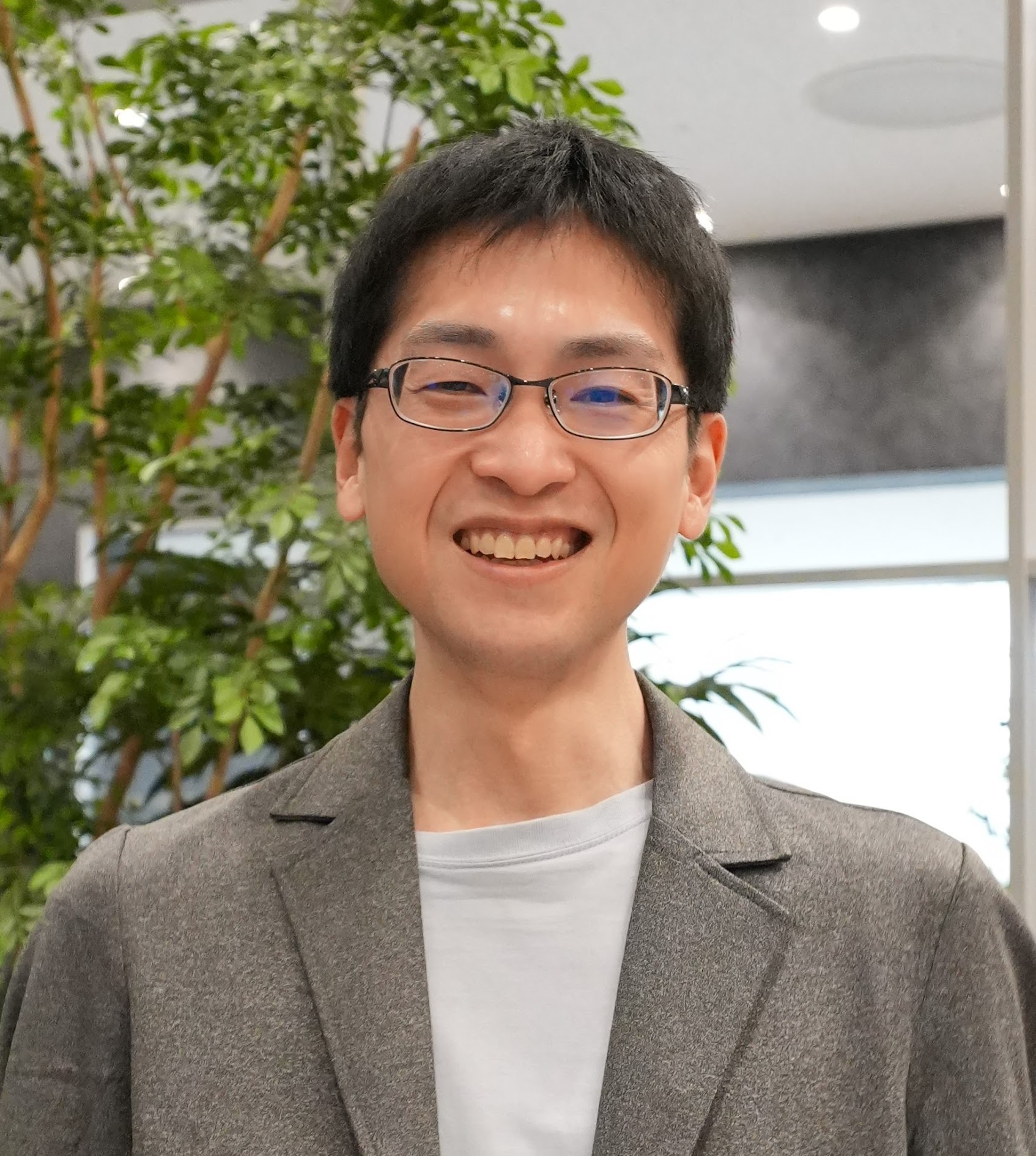 塚田 真規